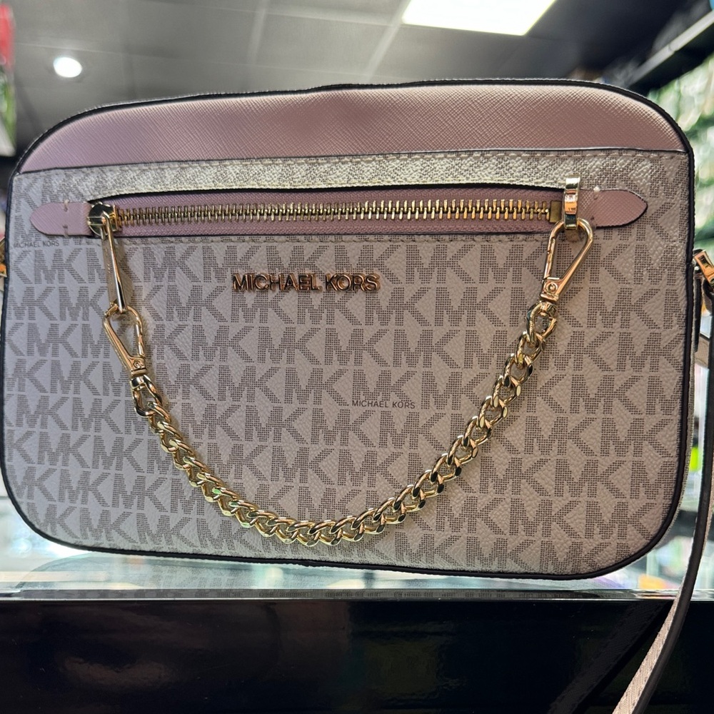 MK Jet Set Crossbody Bag in powder blush featuring gold hardware